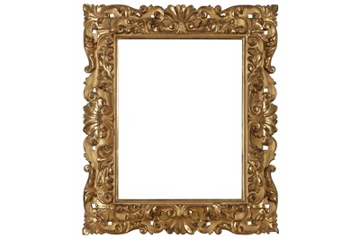 Lot 128 - A FLORENTINE EARLY 20TH CENTURY CARVED, PIERCED AND GILDED FRAME