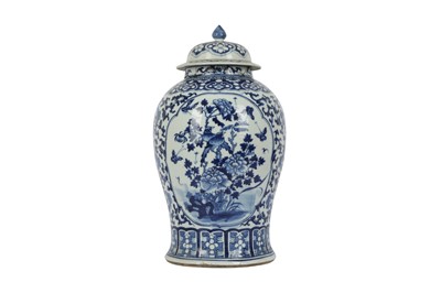 Lot 863 - A CHINESE BLUE AND WHITE BALUSTER VASE AND COVER.