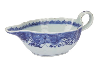 Lot 664 - A CHINESE BLUE AND WHITE PORCELAIN SAUCE BOAT, QIANLONG