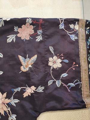 Lot 292 - A CHINESE EMBROIDERED BLUE-GROUND LADY'S ROBE.