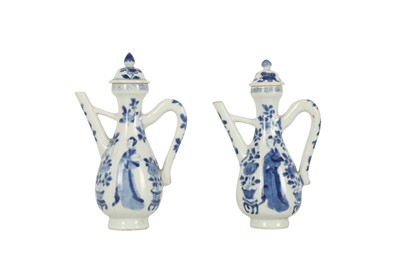 Lot 620 - A NEAR-PAIR OF CHINESE BLUE AND WHITE 'LADIES' EWERS AND COVERS.