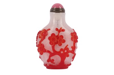 Lot 713 - A CHINESE RED-OVERLAY 'PRUNUS' SNUFF BOTTLE.
