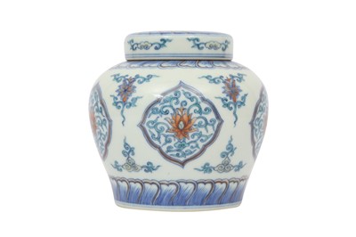 Lot 627 - A CHINESE DOUCAI JAR AND COVER.