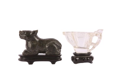 Lot 682 - A CHINESE ROCK CRYSTAL POURING VESSEL AND A HARDSTONE FIGURE OF A LION.