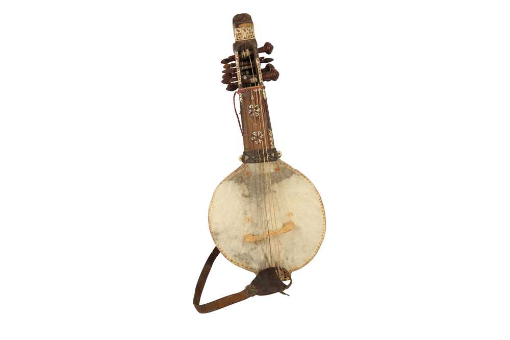 Lot 748 - AN ENSEMBLE OF SOUTH ASIAN INSTRUMENTS FROM