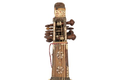 Lot 748 - AN ENSEMBLE OF SOUTH ASIAN INSTRUMENTS FROM THE COLLECTION OF VIRAM JASANI (B. 1945)