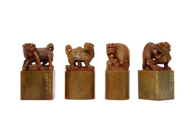 Lot 594 - A SET OF FOUR CHINESE SOAPSTONE SEALS.