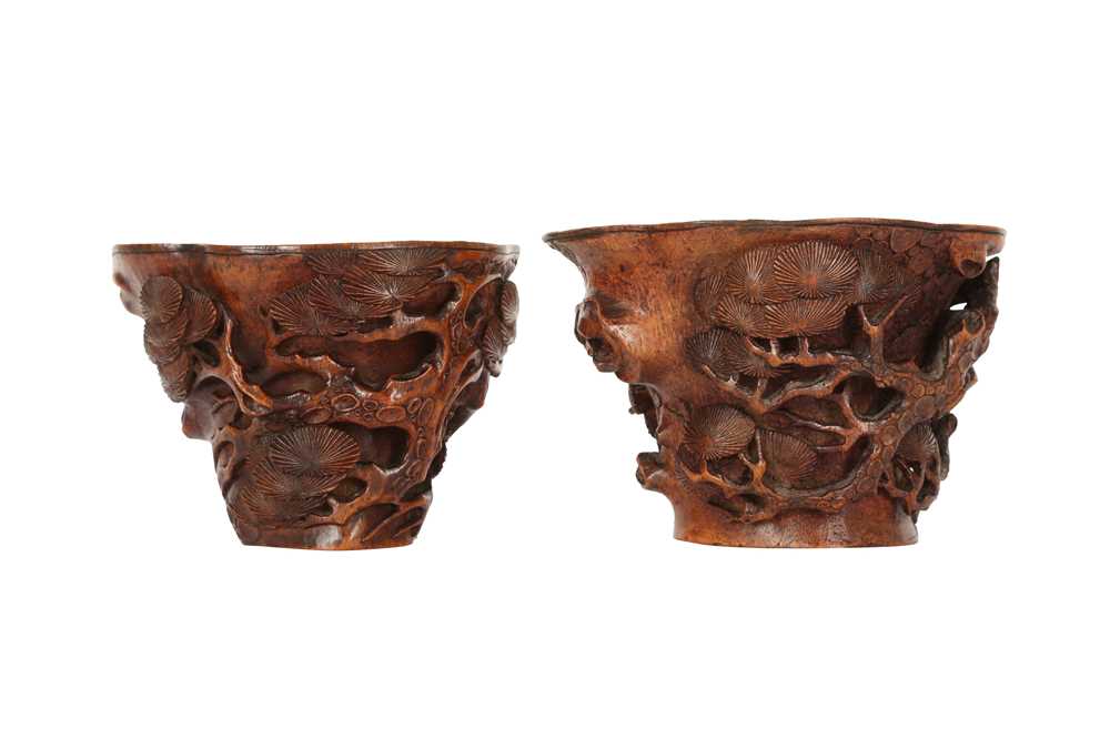 Lot 164 - A PAIR OF CHINESE CARVED BAMBOO 'PINE TREE' LIBATION CUPS.