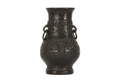 Lot 674 - A CHINESE BRONZE ARCHAISTIC VASE.