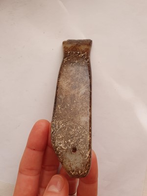 Lot 783 - A CHINESE PALE CELADON JADE 'FISH' CARVING.