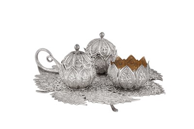 Lot 143 - A late 19th / early 20th century Anglo – Indian unmarked silver cruet, Kashmir circa 1900