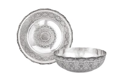 Lot 313 - A very large mid-20th century Iranian (Persian) silver bowl with charger, Isfahan circa 1950
