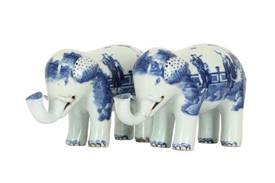 Lot 744 - A PAIR OF CHINESE BLUE AND WHITE ‘EIGHT IMMORTALS’ MODELS OF ELEPHANTS.