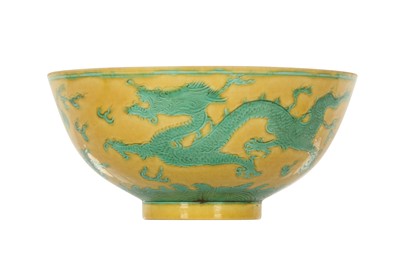 Lot 967 - A CHINESE YELLOW-GROUND GREEN-ENAMELLED 'DRAGON' BOWL.