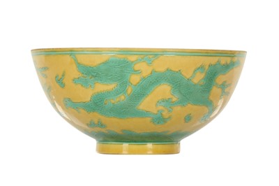 Lot 968 - A CHINESE YELLOW-GROUND GREEN-ENAMELLED 'DRAGON' BOWL.