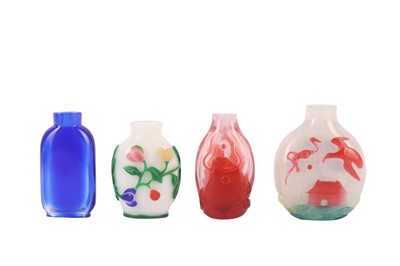 Lot 419 - FOUR CHINESE OVERLAY GLASS SNUFF BOTTLES.