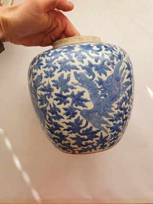 Lot 127 - A NEAR-PAIR OF CHINESE BLUE AND WHITE 'DRAGON' JARS.
