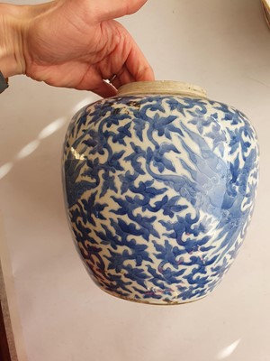 Lot 127 - A NEAR-PAIR OF CHINESE BLUE AND WHITE 'DRAGON' JARS.
