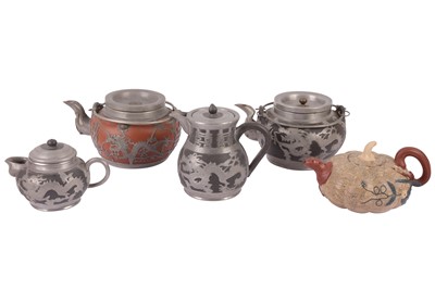 Lot 649 - A SET OF THREE PEWTER AND GREY STONEWARE TEA WARES, 20TH CENTURY