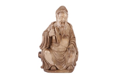 Lot 616 - A CHINESE SOAPSTONE FIGURE OF A SEATED OFFICIAL, PROBABLY LATE 19TH/EARLY 20TH CENTURY