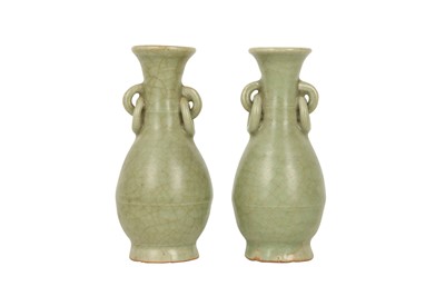 Lot 329 - A PAIR OF CHINESE CELADON-GLAZED VASES.
