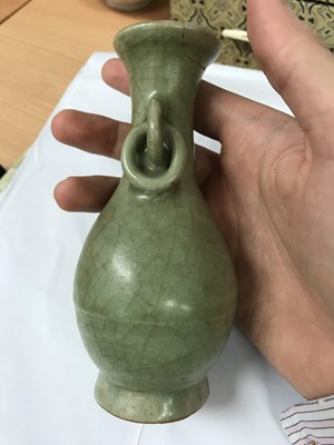 Lot 329 - A PAIR OF CHINESE CELADON-GLAZED VASES.