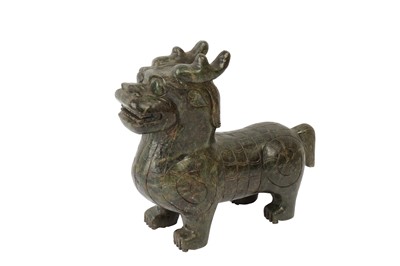 Lot 714 - A CHINESE GREEN HARDSTONE SCULPTURE OF A KYLIN, 20TH CENTURY