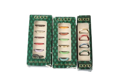 Lot 283 - Gucci Gold Interchangeable Bezel Bangle Watch