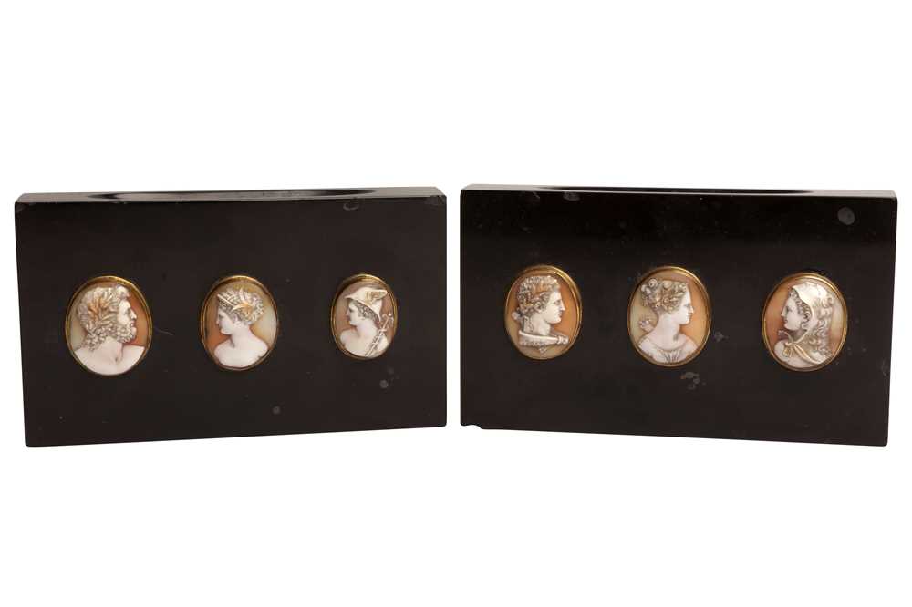 Lot 87 - A PAIR OF ITALIAN BLACK HARDSTONE AND CAMEO MOUNTED PAPER WEIGHTS, 19TH CENTURY