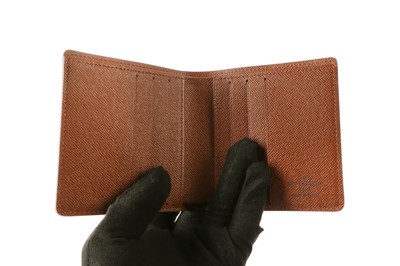 Lot 196 - Louis Vuitton Monogram Folding Slender Wallet