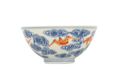 Lot 341 - A CHINESE BLUE AND WHITE AND IRON-RED 'BATS AND CLOUDS' BOWL.