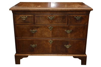 Lot 210 - A GEORGE II AND LATER WALNUT AND OAK CHEST OF DRAWERS
