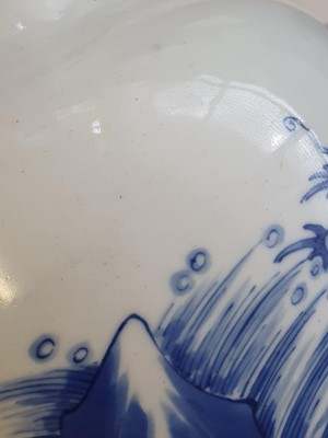 Lot 137 - A CHINESE BLUE AND WHITE 'QILIN ON ROCKS' BALUSTER VASE.