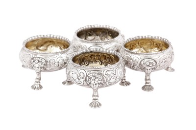 Lot 633 - A set of four George II sterling silver salts, London 1745 by David Hennell (first reg. 23rd June 1736)