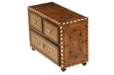 Lot 644 - λ AN IVORY, STAINED WOOD AND BONE-INLAID HARDWOOD CABINET