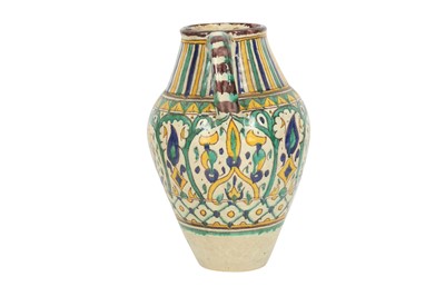Lot 643 - A POLYCHROME-PAINTED CHEMLA POTTERY WATER JUG