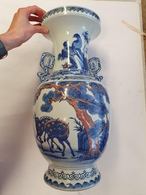 Lot 388 - A LARGE CHINESE BLUE AND WHITE AND UNDERGLAZE RED VASE.