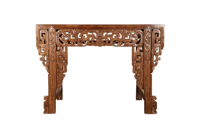 Lot 975 - A CHINESE CARVED WOOD TABLE.