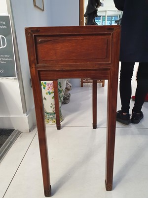 Lot 162 - A CHINESE CARVED TWO-DRAWERED HUANGHUALI SIDE TABLE.