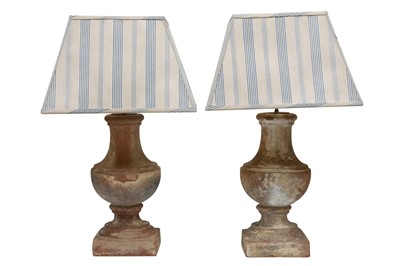 Lot 528 - A PAIR OF DISTRESSED TERRACOTTA TABLE LAMPS