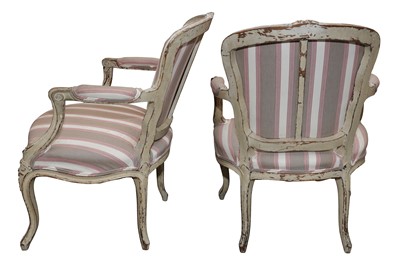 Lot 119 - A PAIR OF LOUIS XVI STYLE PAINTED AND DISTRESSED BEECH FAUTEUIL ARMCHAIRS, 19TH CENTURY