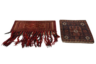 Lot 54 - AN ANTIQUE BALOUCH MAT AND TURKMENISTAN ANIMAL TRAPPING