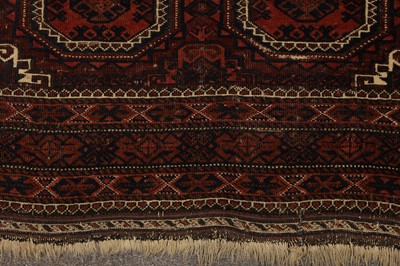 Lot 55 - AN ANTIQUE BALOUCH RUG, NORTH-EAST PERSIA