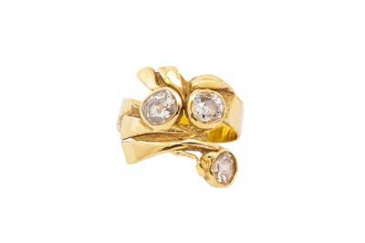 Lot 157 - A diamond three-stone dress ring