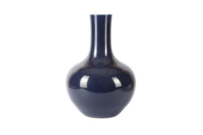 Lot 1013 - A CHINESE BLUE-GLAZED BOTTLE VASE, TIANSHOUPING.