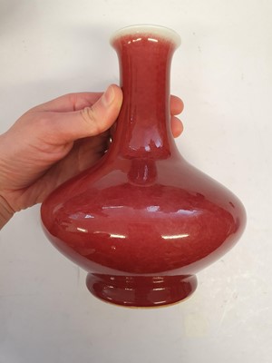Lot 193 - A CHINESE COPPER RED-GLAZED BOTTLE VASE.