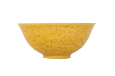 Lot 966 - A CHINESE YELLOW-GLAZED 'DRAGON' BOWL.