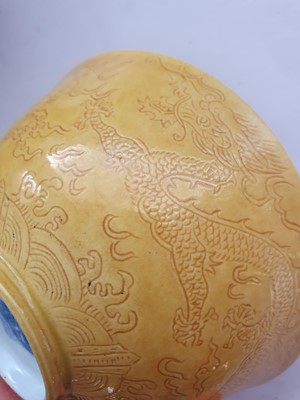 Lot 966 - A CHINESE YELLOW-GLAZED 'DRAGON' BOWL.