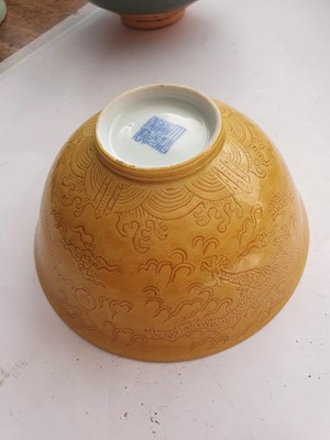 Lot 966 - A CHINESE YELLOW-GLAZED 'DRAGON' BOWL.