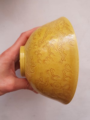 Lot 966 - A CHINESE YELLOW-GLAZED 'DRAGON' BOWL.